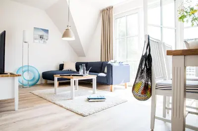 Ein Sitzbereich in der Unterkunft Ferienwohnung Diek 1_5