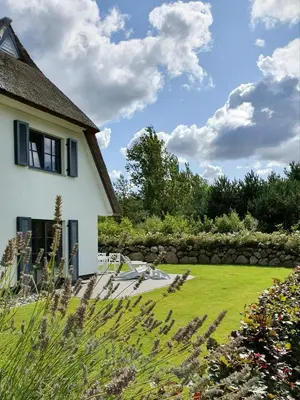 Ein Garten an der Unterkunft Ferienhaus Seeschwalbe 44