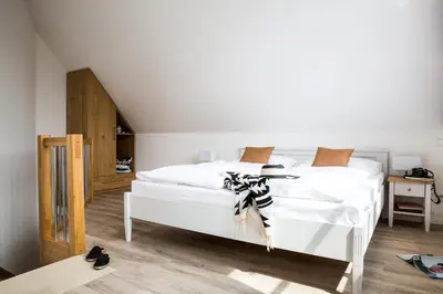 Ein Bett oder Betten in einem Zimmer der Unterkunft Ferienwohnung Buhnen 2_4