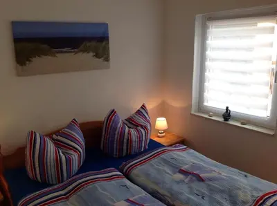 Ein Bett oder Betten in einem Zimmer der Unterkunft Haus Irma