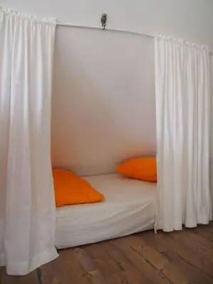 Ein Bett oder Betten in einem Zimmer der Unterkunft Reetdach - Promenadenblick - 500m zum Strand