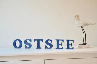 Ein Zertifikat, Auszeichnung, Logo oder anderes Dokument, das in der Unterkunft Villa Strandblick 6 ausgestellt ist