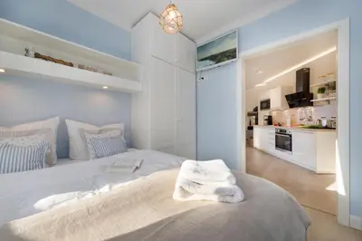 Ein Bett oder Betten in einem Zimmer der Unterkunft Villa Strandblick 8