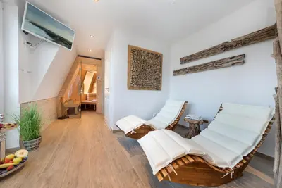 Ein Sitzbereich in der Unterkunft Villa Strandblick 8