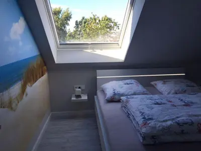 Ein Bett oder Betten in einem Zimmer der Unterkunft 