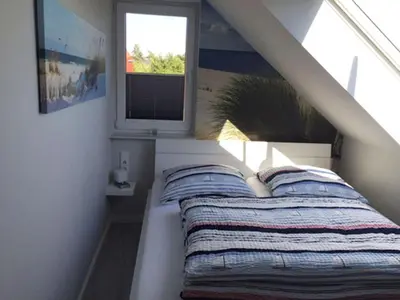 Ein Bett oder Betten in einem Zimmer der Unterkunft 