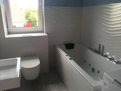 Ein Badezimmer in der Unterkunft 