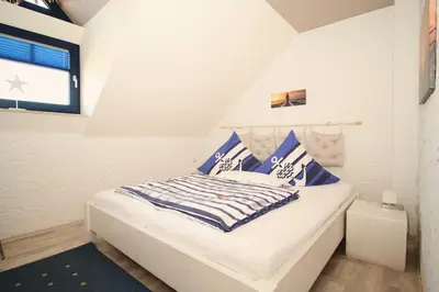 Ein Bett oder Betten in einem Zimmer der Unterkunft 