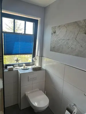 Ein Badezimmer in der Unterkunft 