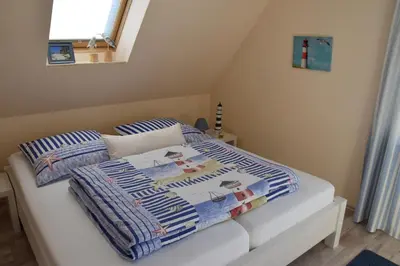 Ein Bett oder Betten in einem Zimmer der Unterkunft 