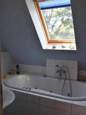 Ein Badezimmer in der Unterkunft 