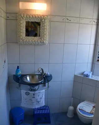 Ein Badezimmer in der Unterkunft 
