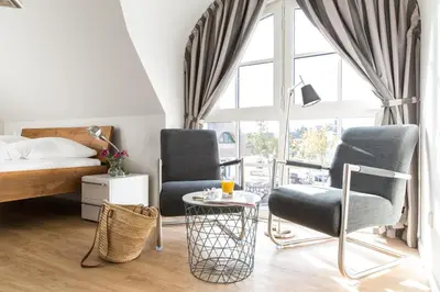 Ein Sitzbereich in der Unterkunft Ferienhaus Schilfrohrsaenger 36