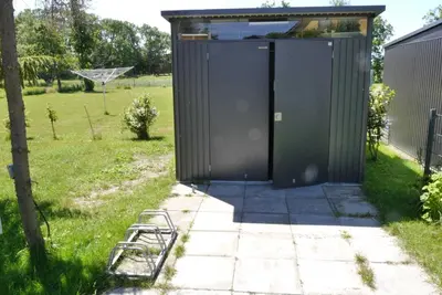 Ein Garten an der Unterkunft Ferienhaus am Saaler Bodden