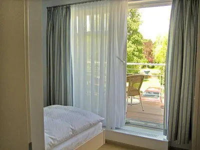 Ein Bett oder Betten in einem Zimmer der Unterkunft Ferienhaus Sundevit Nr 1 Prerow