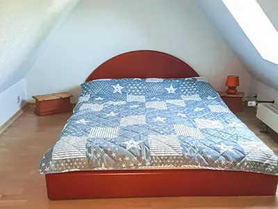 Ein Bett oder Betten in einem Zimmer der Unterkunft Haus Jasmin