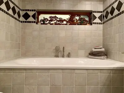 Ein Badezimmer in der Unterkunft Haus am Hafen - Kaminfeeling und Luxus unter Reet