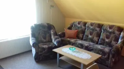 Ein Sitzbereich in der Unterkunft Ferienwohnung in Boddennähe