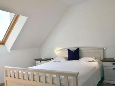 Ein Bett oder Betten in einem Zimmer der Unterkunft Exklusive Panoramawohnung in Barth