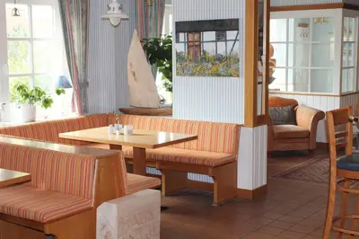 Ein Sitzbereich in der Unterkunft Haus Antje