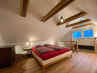 Ein Bett oder Betten in einem Zimmer der Unterkunft Ferienhaus Becker II