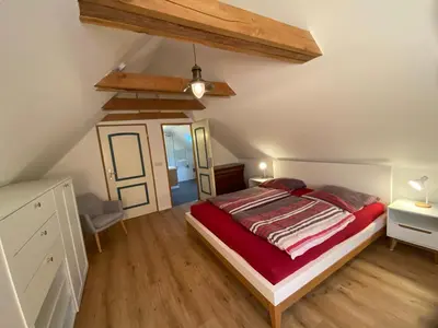 Ein Bett oder Betten in einem Zimmer der Unterkunft Ferienhaus Becker II
