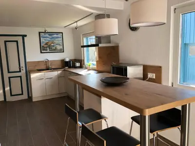Küche/Küchenzeile in der Unterkunft Ferienhaus Becker - Wohnung unten mit grosser Darssveranda