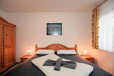 Ein Bett oder Betten in einem Zimmer der Unterkunft Appartementhaus 