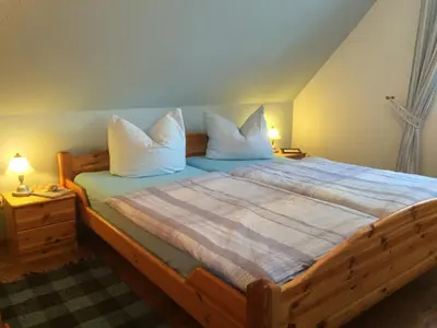Ein Bett oder Betten in einem Zimmer der Unterkunft Ferienwohnung Morgensonne