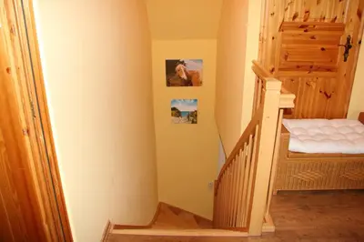 Ein Bett oder Betten in einem Zimmer der Unterkunft Ferienwohnung Morgensonne