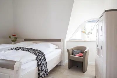 Ein Bett oder Betten in einem Zimmer der Unterkunft Ferienhaus Seeadler 24