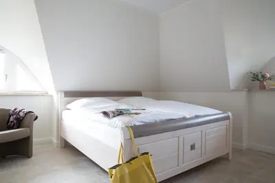 Ein Bett oder Betten in einem Zimmer der Unterkunft Ferienhaus Seeadler 24