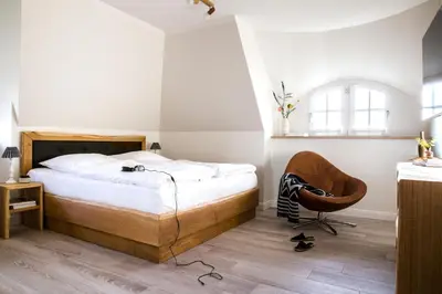 Ein Bett oder Betten in einem Zimmer der Unterkunft Ferienhaus Seeadler 65