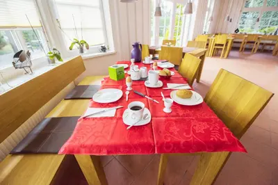 Ein Restaurant oder anderes Speiselokal in der Unterkunft Pension Achtern Wieck