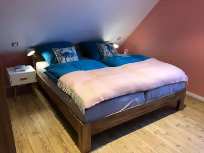 Ein Bett oder Betten in einem Zimmer der Unterkunft Ferienhaus Barti