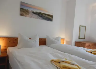 Ein Bett oder Betten in einem Zimmer der Unterkunft Resi A2