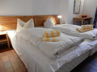 Ein Bett oder Betten in einem Zimmer der Unterkunft Resi H1