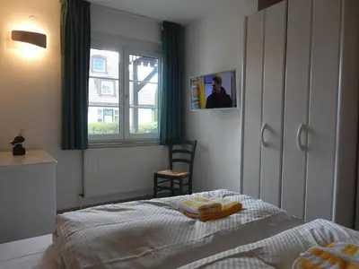 Ein Bett oder Betten in einem Zimmer der Unterkunft Resi P2