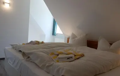 Ein Bett oder Betten in einem Zimmer der Unterkunft Resi A5