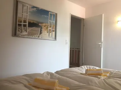 Ein Bett oder Betten in einem Zimmer der Unterkunft Resi A7