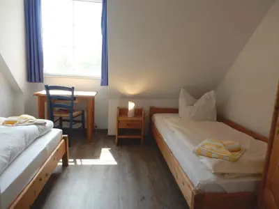 Ein Bett oder Betten in einem Zimmer der Unterkunft Resi A7