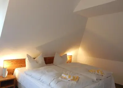 Ein Bett oder Betten in einem Zimmer der Unterkunft Resi A7