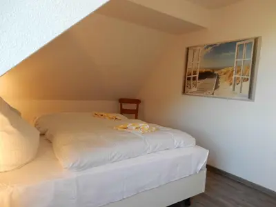 Ein Bett oder Betten in einem Zimmer der Unterkunft Resi A7