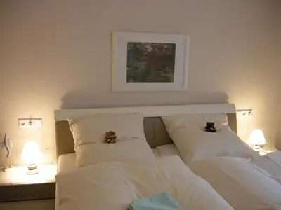 Ein Bett oder Betten in einem Zimmer der Unterkunft Resi F3
