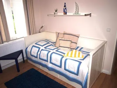 Ein Bett oder Betten in einem Zimmer der Unterkunft Resi F3