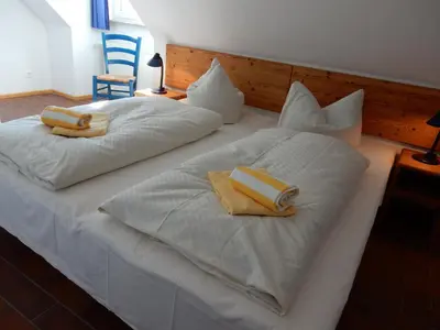 Ein Bett oder Betten in einem Zimmer der Unterkunft Resi F7
