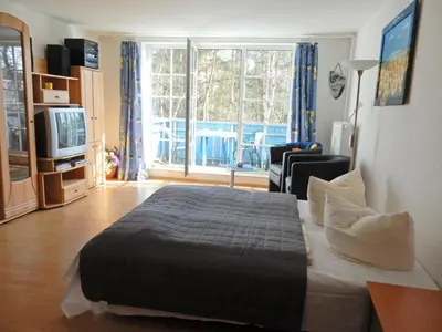 Ein Bett oder Betten in einem Zimmer der Unterkunft Gästehaus Whg 11