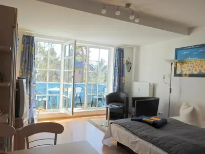 Ein Bett oder Betten in einem Zimmer der Unterkunft Gästehaus Whg 11