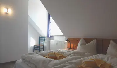 Ein Bett oder Betten in einem Zimmer der Unterkunft Resi K5