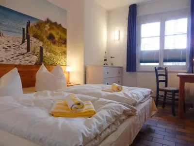 Ein Bett oder Betten in einem Zimmer der Unterkunft Resi M4